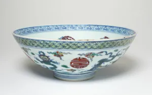 Underglaze Blue Gallery: Bowl with Dragons and Phoenixes, Qing dynasty (1644-1911), 18th century. Creator: Unknown