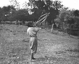 Publishers Macmillan Gallery: Boy with a Cross Bow at Sinope, c1906-1913, (1915). Creator: Mark Sykes