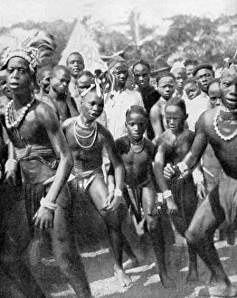 Peoples Of The World In Pictures Gallery: Boy dancers dressed as girls, the Yafouba tribe, West Africa, 1936.Artist: Wide World Photos
