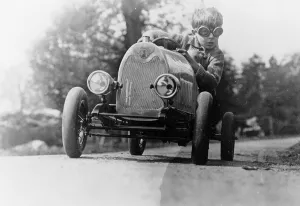 Boy Racer Prints: Boy in a pedal car