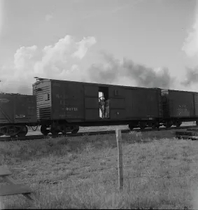 Freight Wagon Prints: Boy riding freight, West Texas, 1937. Creator: Dorothea Lange