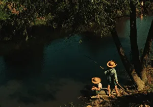 Slides Color Gmgpc Prints: Boys fishing in a bayou, Schriever, La. 1940. Creator: Marion Post Wolcott