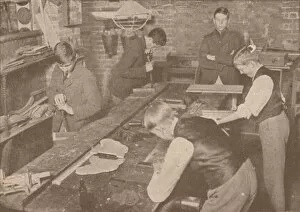 War Work Gallery: Boys of Harrow School making splints, crutches and other articles for the wounded, c1916 (1928)