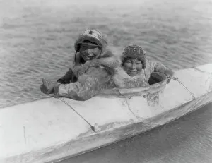 Kayak Prints: Boys in a kaiak (i.e. kayak)-Nunivak, c1929. Creator: Edward Sheriff Curtis