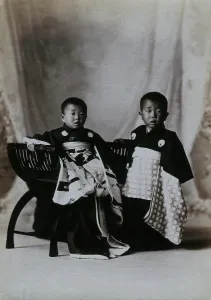 Childrenswear Prints: Two boys in a photographic studio