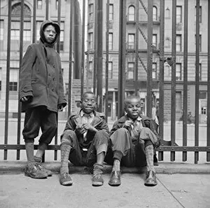 Sock Collection: Three boys who live in the Harlem area, New York, 1943. Creator: Gordon Parks