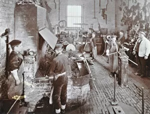 Apprentice Gallery: Boys at work in the smiths shop, Feltham Industrial School, London, 1908