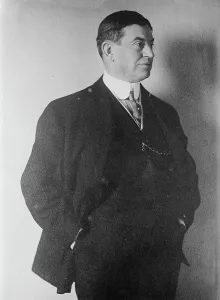 Hands In Pockets Prints: B.R. Winchell, 1913. Creators: Bain News Service, George Graham Bain