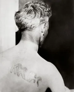 Detroit Prints: The branded back of Reverend Orrin Van Loon, Detroit, Michigan, USA, July 1924. Artist