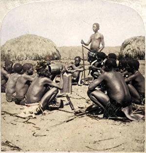 Deciding Gallery: Braves of a Zulu Village holding a Council, near the Umlaloose River, Zululand, S.A. 1901