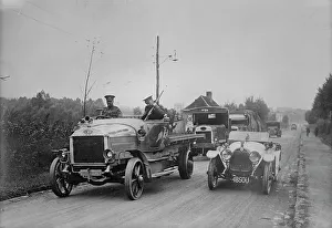 Overtaking Prints: British armored autos in France, between c1910 and c1915. Creator: Bain News Service