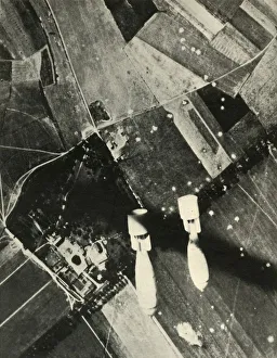 Bombs Prints: More British Bombs on an Enemy-Held Aerodrome, 1939-1940, (1941). Creator: Unknown