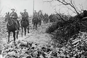 April Prints: British Cavalry passing thro wrecked village, 21 Apr 1917.. Creator: Bain News Service