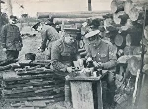 Expeditionary Force Gallery: British engineers with the Expeditionary Force making hand grenades out of tobacco tins, c1914