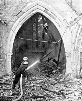 British firefighters damping down a bombed church, World War II, June 1940 British firefighters damping down a bombed church, World War II, June 1940