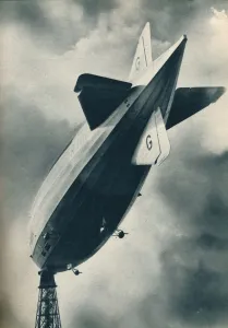 Air Travel Prints: British rigid airship R101 riding at her mooring mast at Cardington