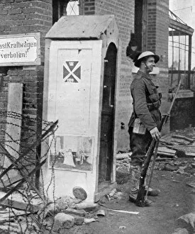 Images Dated 16th January 2008: A British soldier on sentry duty after the fall of Peronne, France, First World War, 1917, (c1920)