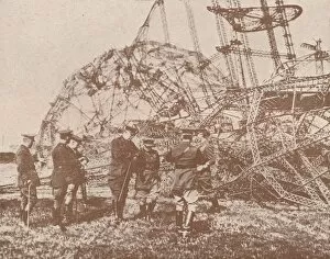 Framework Collection: British staff officers examining the wreckage of a Zeppelin brought down in England, c1917 (1919)