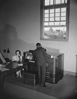 Broadcast tower at Howard University during commencement exercises, Washington, D.C, 1942. Creator: Gordon Parks