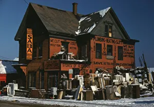 Second Hand Prints: Brockton, Mass. Dec. 1940, second-hand plumbing store, 1940. Creator: Jack Delano