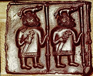 Matrix Prints: Bronze Matrix for making decorative peaques for helmets, 8th century