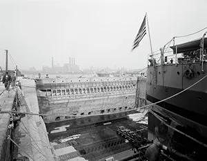 Graving Dock Prints: Brooklyn Navy Yard, dock no. 4 gate, c.between 1910 and 1920. Creator: Unknown