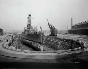 Graving Dock Prints: Brooklyn Navy Yard, dry dock no. 4, c.between 1910 and 1920. Creator: Unknown