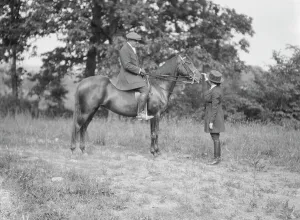 Bruce Prints: Bruce, J.M. Mr. on horseback, with Mrs. Bruce, 1919 May 30. Creator: Arnold Genthe