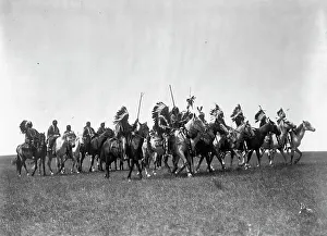 Lakota Prints: Brulé war party, c1907. Creator: Edward Sheriff Curtis