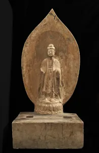 Buddhist tablet: standing figure in high relief; right hand missing, Period of Division Buddhist tablet: standing figure in high relief; right hand missing, Period of Division
