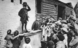 Charles Chaplin Prints: A budding Charlie Chaplin admirer, east end of London, 1926-1927