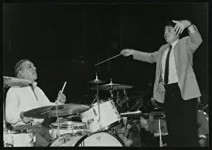 Baton Gallery: Buddy Rich and conductor Andrew Litton, Royal Festival Hall, London, June 1985. Artist