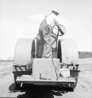 Building the road to the community factory, Hightstown, New Jersey, 1936. Creator: Dorothea Lange