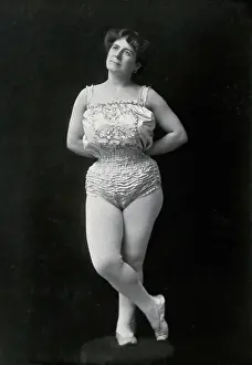 Legs Crossed Prints: A Bulgarian female acrobat wearing a leotard and tights