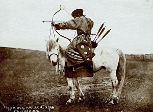 Mongolian Prints: Buryat on horseback with bow, 1895-1939. Creator: L Veniukov