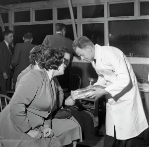 Butcher from Danish Bacon giving a demonstration, Kilnhurst, South Yorkshire, 1961