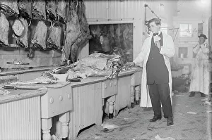 Butcher Prints: Butcher stands idle before his counter of meat during the meat boycott