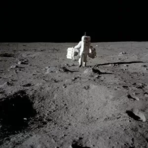 Buzz Aldrin carries out an experiment on the lunar surface, Apollo II mission, July 1969