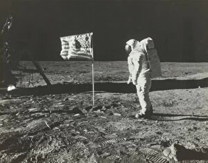 Buzz Aldrin Gallery: Buzz Aldrin on the Moon with the American Flag, 1969. Creator: Neil Armstrong