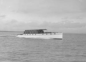 Cabin Cruiser Prints: Cabin cruiser D. G. S. P. 1913. Creator: Kirk & Sons of Cowes