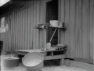 Buckets Prints: Cabin in Hancock County, Mississippi, 1937. Creator: Dorothea Lange