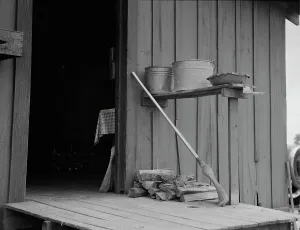 Buckets Prints: Cabin in Hancock County, Mississippi, 1937. Creator: Dorothea Lange