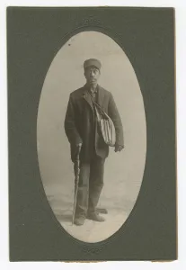 Cabinet card of a newspaper carrier, mid to late 19th century. Creator: Unknown