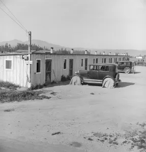 Ten cabins which rent for ten dollars... Arkansawyers...camp, Greenfield, Salinas Valley, CA, 1939 Ten cabins which rent for ten dollars... Arkansawyers...camp, Greenfield, Salinas Valley, CA, 1939