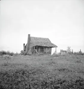 Shingles Prints: Many cabins of this type are found on the Mississippi Delta, 1936. Creator: Dorothea Lange