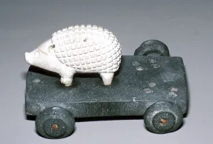 Calcite and bitumen hedgehog mounted on wheeled base, Susa, c12th century BC Calcite and bitumen hedgehog mounted on wheeled base, Susa, c12th century BC