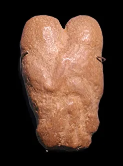 Calcite statuette showing two humans in an embrace, 30th century BC