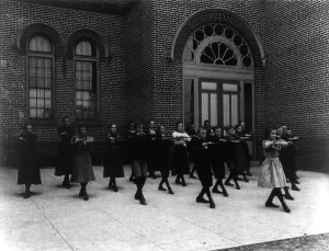 Calisthenics or dance class, outdoors, 3rd Division, (1899?). Creator: Frances Benjamin Johnston