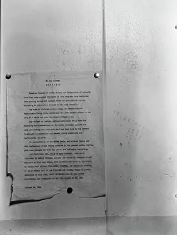 Camp bulletin board in Shafter camp for migratory workers, FSA camp, California, 1938. Creator: Dorothea Lange