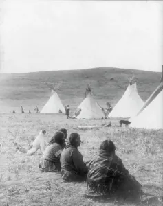 Tipis Prints: Camp gossips-Atsina, c1908. Creator: Edward Sheriff Curtis